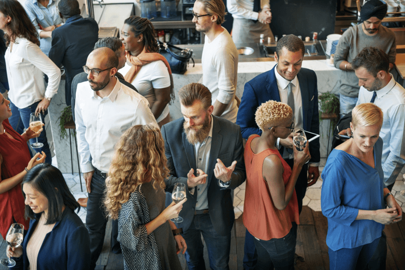 People in business attire having drinks